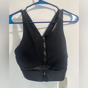 Medium black fabletics zip up workout cross back workout top nwt